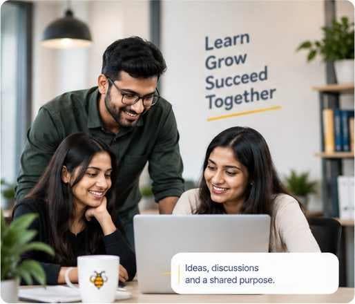 KnowledgeBeez teammates learning and working together around a laptop