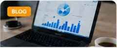 Data analytics charts and insights on modern dual-screen workstation